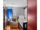 Comfortable bedroom featuring a recliner, a bed and a large armoire at 1917 Lake Ridge Ct, Jonesboro, GA 30236