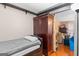 Comfortable bedroom featuring a bed and storage space, and view to a living space at 1917 Lake Ridge Ct, Jonesboro, GA 30236