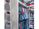 Organized closet features clothing racks and storage for shoes and personal items at 1917 Lake Ridge Ct, Jonesboro, GA 30236