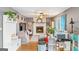 Charming living room featuring a stone fireplace, cozy seating, and stylish decor at 1917 Lake Ridge Ct, Jonesboro, GA 30236