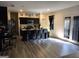 Open concept kitchen with a center island, modern stools, and stainless steel appliances at 99 Cooperton, Villa Rica, GA 30180