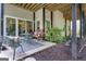 Relaxing back porch with comfortable seating and views, perfect for relaxation and outdoor enjoyment at 120 Masters N Dr, Peachtree City, GA 30269