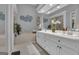 Elegant bathroom boasts a soaking tub, double sinks, and stylish vanity with ample counter space at 120 Masters N Dr, Peachtree City, GA 30269