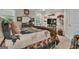 Comfortable bedroom with a large bed, lots of pillows, and a view of the surrounding yard at 120 Masters N Dr, Peachtree City, GA 30269