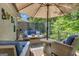 Comfortable outdoor seating area featuring wicker furniture and privacy screen at 120 Masters N Dr, Peachtree City, GA 30269
