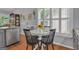 Charming dining area with natural light, built-in cabinet, and a view of the outdoors at 120 Masters N Dr, Peachtree City, GA 30269