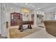 Spacious recreation room with a foosball table, wet bar, and seating area, perfect for entertaining at 120 Masters N Dr, Peachtree City, GA 30269