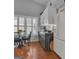 Cozy kitchen nook with a round table, chairs, and natural light from the windows at 120 Masters N Dr, Peachtree City, GA 30269