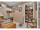 Home office with wooden desk, decor, and a chair with open shelving, great for work or study at 120 Masters N Dr, Peachtree City, GA 30269