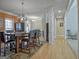 Open-concept dining room featuring stylish decor, natural light and direct access to other rooms at 100 Clydesdale Ct, Tyrone, GA 30290