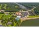 A complete view of the club house, pool, and tennis courts from above at 127 Darwish Dr, Mcdonough, GA 30252
