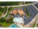 Overhead view of a community center with a pool, tennis courts, and ample parking at 127 Darwish Dr, Mcdonough, GA 30252