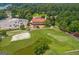 A high angle of the community area, showing a golf course and the clubhouse at 127 Darwish Dr, Mcdonough, GA 30252