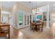 Inviting dining area filled with natural light connects to a comfortable living space at 127 Darwish Dr, Mcdonough, GA 30252