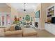 Spacious living room features a fireplace, built-in shelving, and plenty of natural light at 127 Darwish Dr, Mcdonough, GA 30252