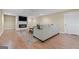 Inviting living room with fireplace, TV, wood-look floors, and neutral-toned seating at 127 Darwish Dr, Mcdonough, GA 30252