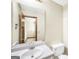 Bright bathroom features a white sink and vanity with neutral tile floors at 175 Laney Ct, Mcdonough, GA 30252