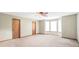 Bright bedroom with a bay window and two large closets, offering ample natural light and storage at 175 Laney Ct, Mcdonough, GA 30252