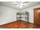 Bedroom features laminate wood flooring and a loft bed at 175 Laney Ct, Mcdonough, GA 30252