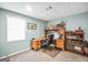 Cozy home office features a built-in desk and shelving for work and display at 175 Laney Ct, Mcdonough, GA 30252
