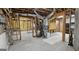 Unfinished basement showing frame and HVAC with water heater and other utility equipment at 1008 Stonekirk Trce, Lawrenceville, GA 30043