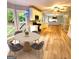 Open concept kitchen with a view to a breakfast nook, and living room at 1008 Stonekirk Trce, Lawrenceville, GA 30043