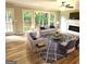 Spacious living room with large windows offering views of the backyard at 1008 Stonekirk Trce, Lawrenceville, GA 30043