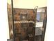 This shower features decorative tile, and a built in seat at 1008 Stonekirk Trce, Lawrenceville, GA 30043