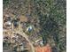 Aerial view of the home on a wooded lot surrounded by trees at 340 Antebellum Way, Fayetteville, GA 30215