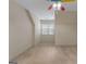 Spacious bedroom with neutral walls, carpet, and a window providing natural light at 340 Antebellum Way, Fayetteville, GA 30215