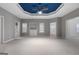 Spacious primary bedroom featuring a tray ceiling and built-in cabinets at 340 Antebellum Way, Fayetteville, GA 30215