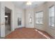 Bedroom with tile flooring and door leading to the backyard and has a ceiling fan at 340 Antebellum Way, Fayetteville, GA 30215