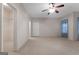 Spacious bedroom featuring carpet flooring, ceiling fan, and closet at 340 Antebellum Way, Fayetteville, GA 30215