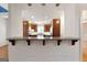 Kitchen with breakfast bar, pendant lighting, wooden cabinetry, and stainless steel appliances at 340 Antebellum Way, Fayetteville, GA 30215