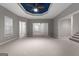 Large living room area with carpet and an open floor plan at 340 Antebellum Way, Fayetteville, GA 30215