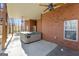 Covered patio features a hot tub and ceiling fans at 340 Antebellum Way, Fayetteville, GA 30215