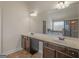 Bathroom vanity features double sinks, ample counter space, and stylish dark wood cabinets at 1225 Polk Xing, Mcdonough, GA 30252