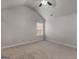Bedroom featuring a vaulted ceiling, a ceiling fan, and a bright window at 1225 Polk Xing, Mcdonough, GA 30252