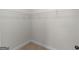 Walk-in closet features a wire shelf and neutral colored carpet at 1225 Polk Xing, Mcdonough, GA 30252