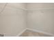 Walk-in closet with basic wire shelving for organized storage at 1225 Polk Xing, Mcdonough, GA 30252