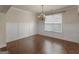 Bright dining room with hardwood floors, paneled walls and a modern chandelier at 1225 Polk Xing, Mcdonough, GA 30252