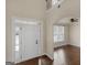 Inviting foyer with hardwood floors, a soaring ceiling, and natural light at 1225 Polk Xing, Mcdonough, GA 30252