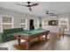 Entertainment room with a pool table, dart board, and ceiling fans at 1225 Polk Xing, Mcdonough, GA 30252
