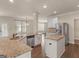 Kitchen with granite countertops, stainless appliances and an island with a sink at 1225 Polk Xing, Mcdonough, GA 30252