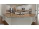Gourmet kitchen with stainless steel appliances, granite counters and eat in bar at 1225 Polk Xing, Mcdonough, GA 30252