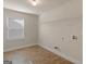 Laundry room with tiled floor features window and washer/dryer hookups at 1225 Polk Xing, Mcdonough, GA 30252