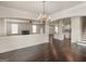 Open concept floor plan with large living space featuring hardwood floors at 1225 Polk Xing, Mcdonough, GA 30252