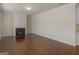 Living room with hardwood flooring and fireplace at 1225 Polk Xing, Mcdonough, GA 30252