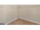 Walk-in closet offers organizational opportunities with upper wire rack shelf at 1225 Polk Xing, Mcdonough, GA 30252