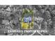 Aerial view highlighting the property lines of a home surrounded by lush greenery and neighboring houses at 248 Montrose Dr, Mcdonough, GA 30253